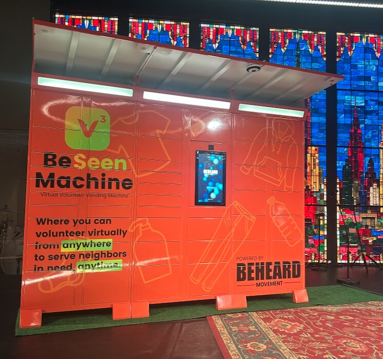 The BeSeen Machine — exterior view of the virtual volunteer vending machine, branded with BeHeard Movement