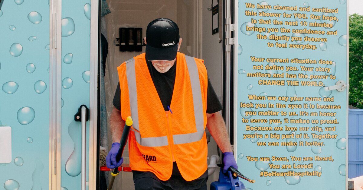 BeHeard Movement mobile drop-in center with volunteers providing hygiene services